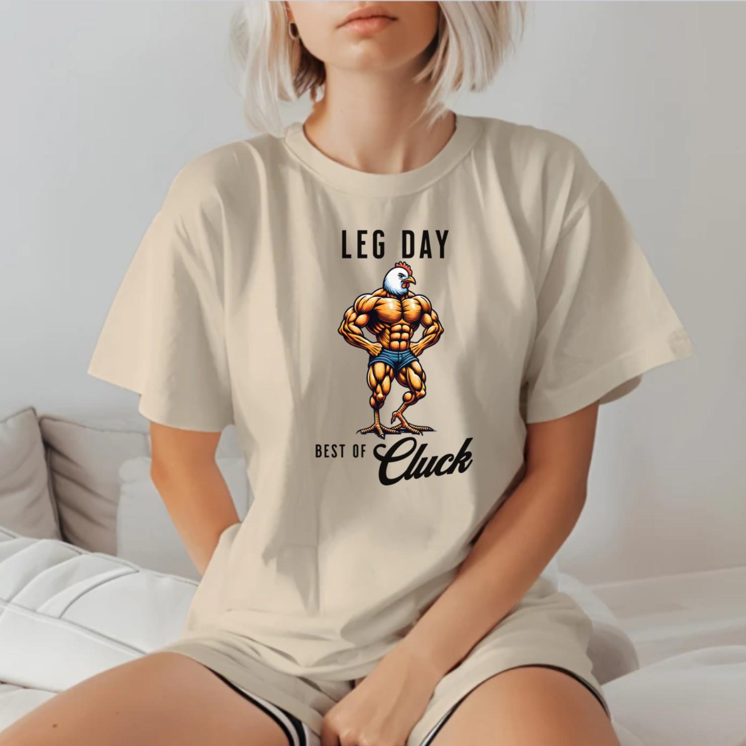 "Bold gym T-shirt featuring a unique muscular chicken design, perfect for fitness enthusiasts. Ideal for workouts, weightlifting, and cardio."