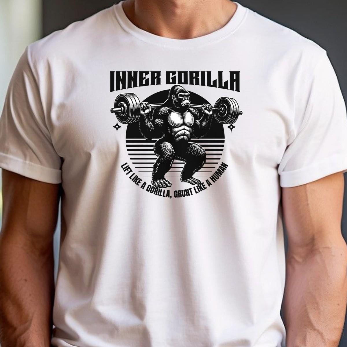 Alt text: "Gorilla Gym T-Shirt featuring a bold graphic of a powerful gorilla lifting weights, symbolizing strength and fitness motivation."