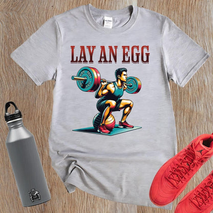Alt text: "Bold gym T-shirt featuring a dynamic lifter in action; perfect for fitness enthusiasts. Motivational design for workouts."