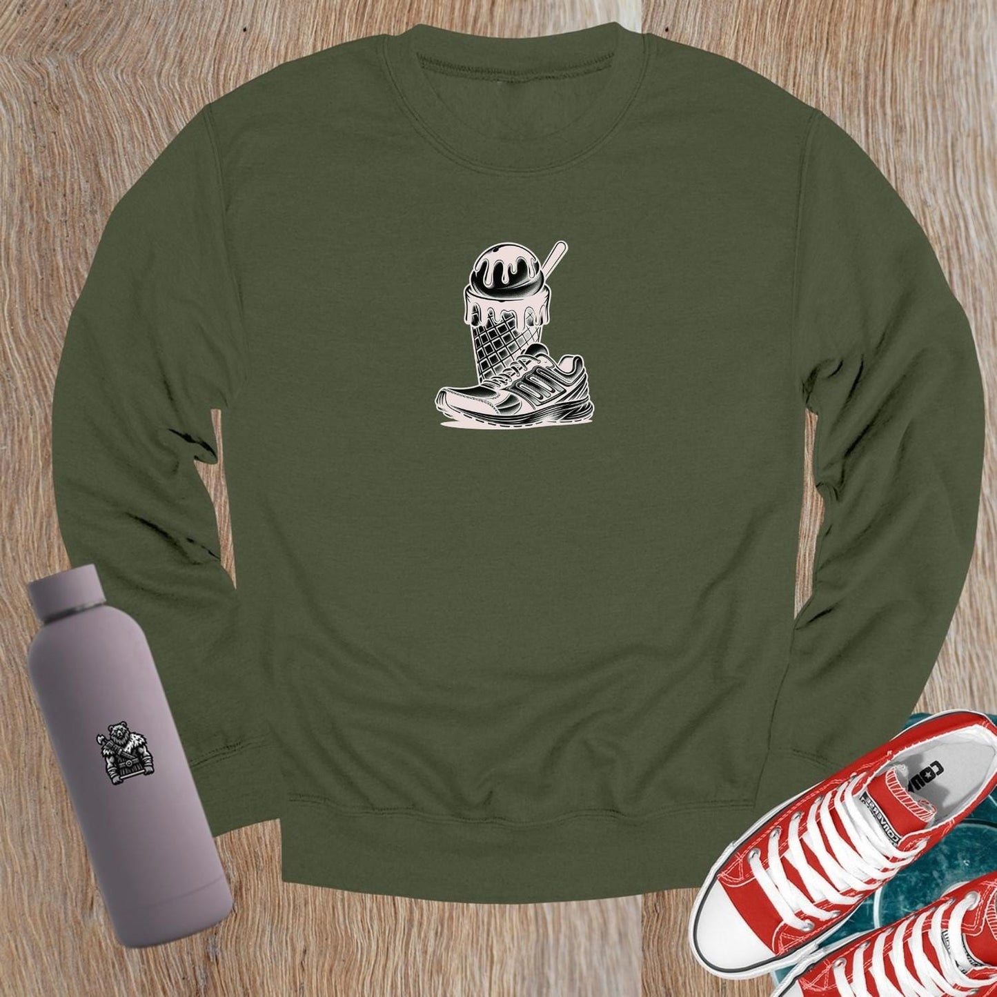 "Vibrant crewneck sweatshirt featuring a bold sneaker and melting ice cream cone design, perfect for gym enthusiasts who love style."