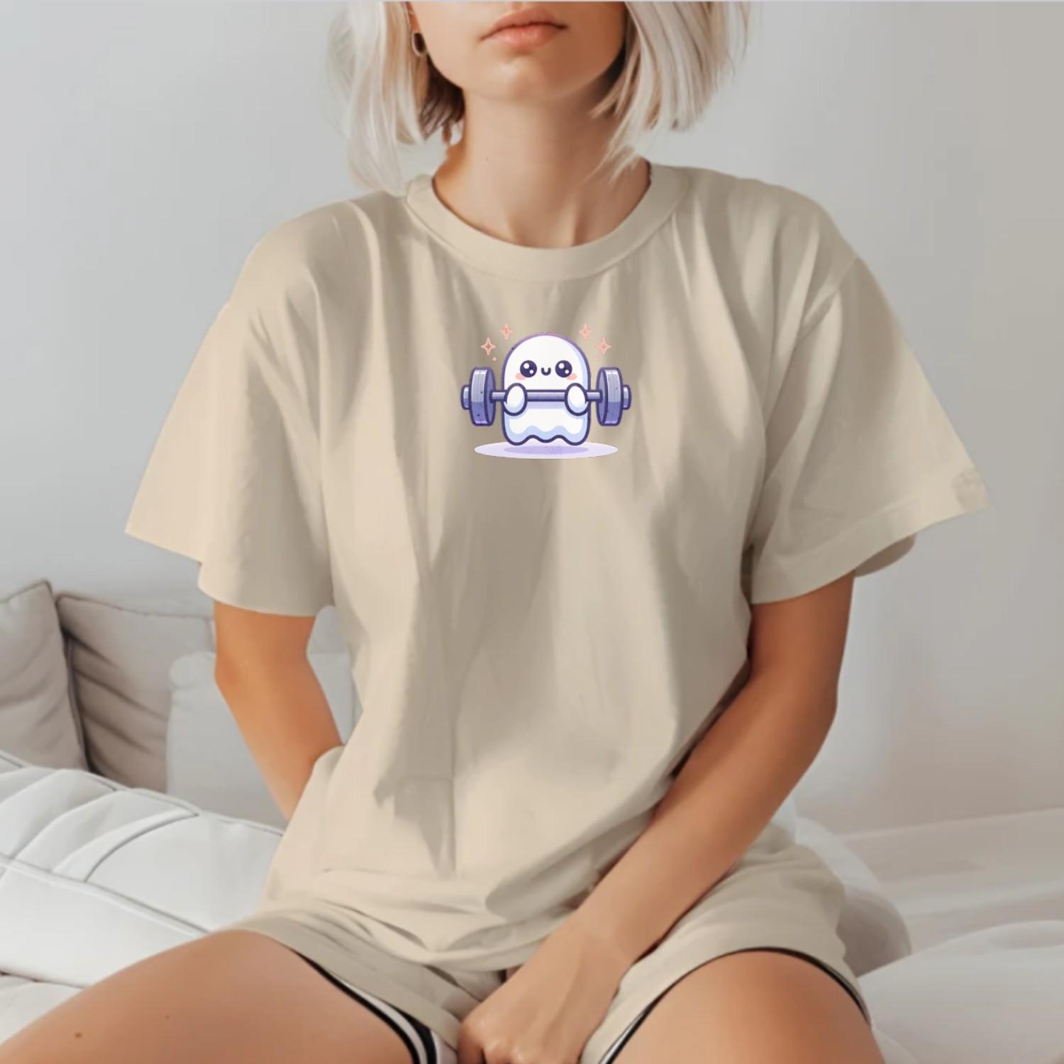 Alt text: "Playful ghost lifting weights on a whimsical Ghost Gym T-Shirt, perfect for gym enthusiasts and casual wear, showcasing unique fitness style."
