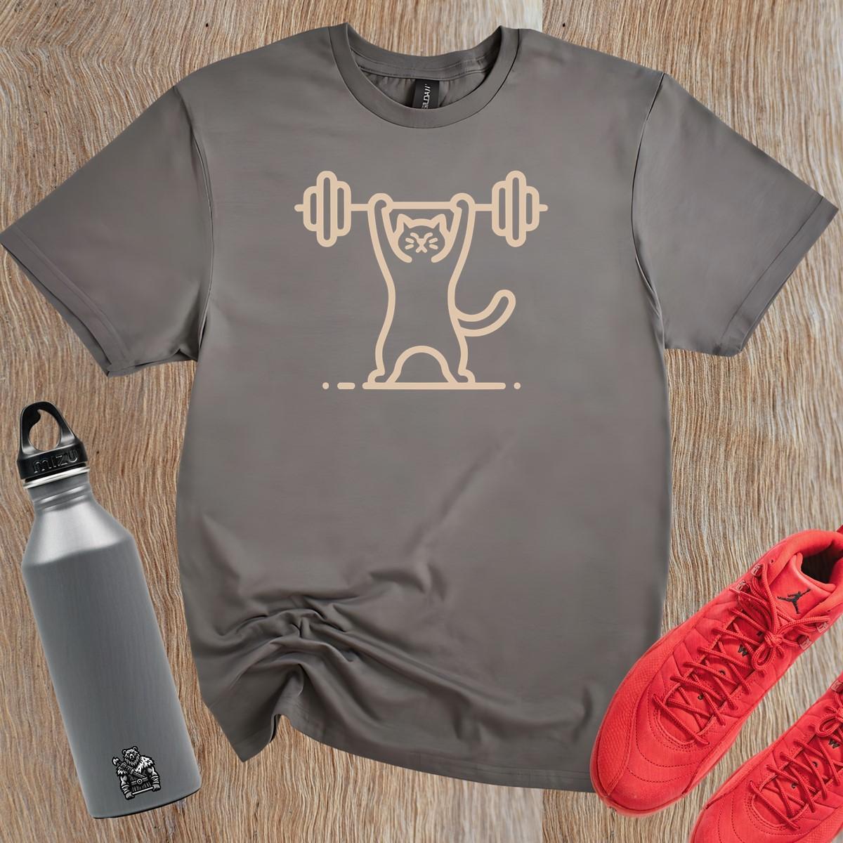 Alt text: "Funny Cat Lifting Weights T-shirt featuring a determined cat showcasing strength, perfect for fitness enthusiasts and gym lovers."
