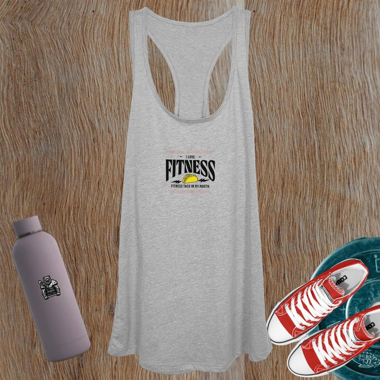 "Vibrant women's gym tank top featuring a playful taco design, perfect for workouts or casual wear. Relaxed fit for easy movement."