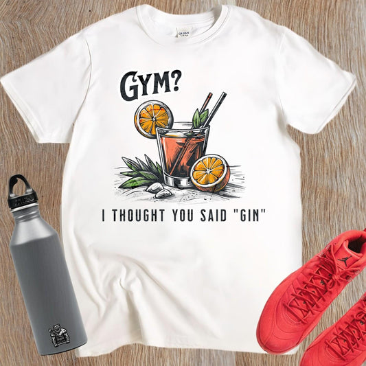 Alt text: "Quirky 'Gym? I Thought You Said Gin' graphic T-shirt for fitness enthusiasts, featuring vibrant colors and humorous design, perfect for workouts and casual wear."