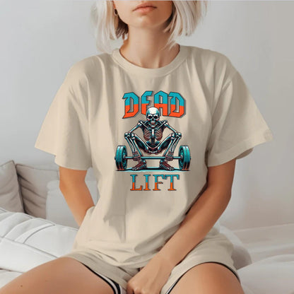 "Graphic T-shirt featuring a skeleton lifting weights, perfect for fitness enthusiasts. Bold design ideal for gym workouts and casual wear."