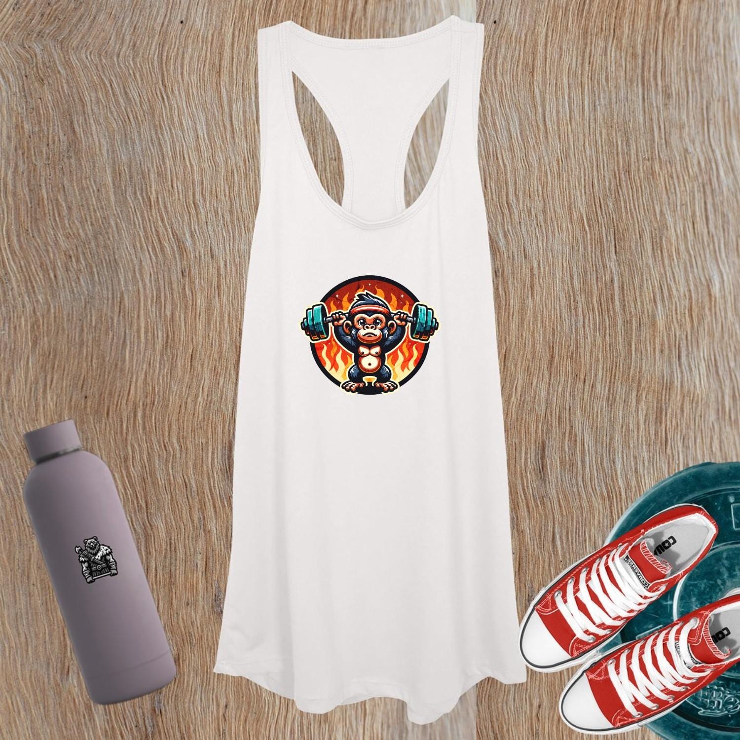 "Women's gym tank top featuring a weightlifting monkey design, blending style and performance for fitness enthusiasts and casual wear."