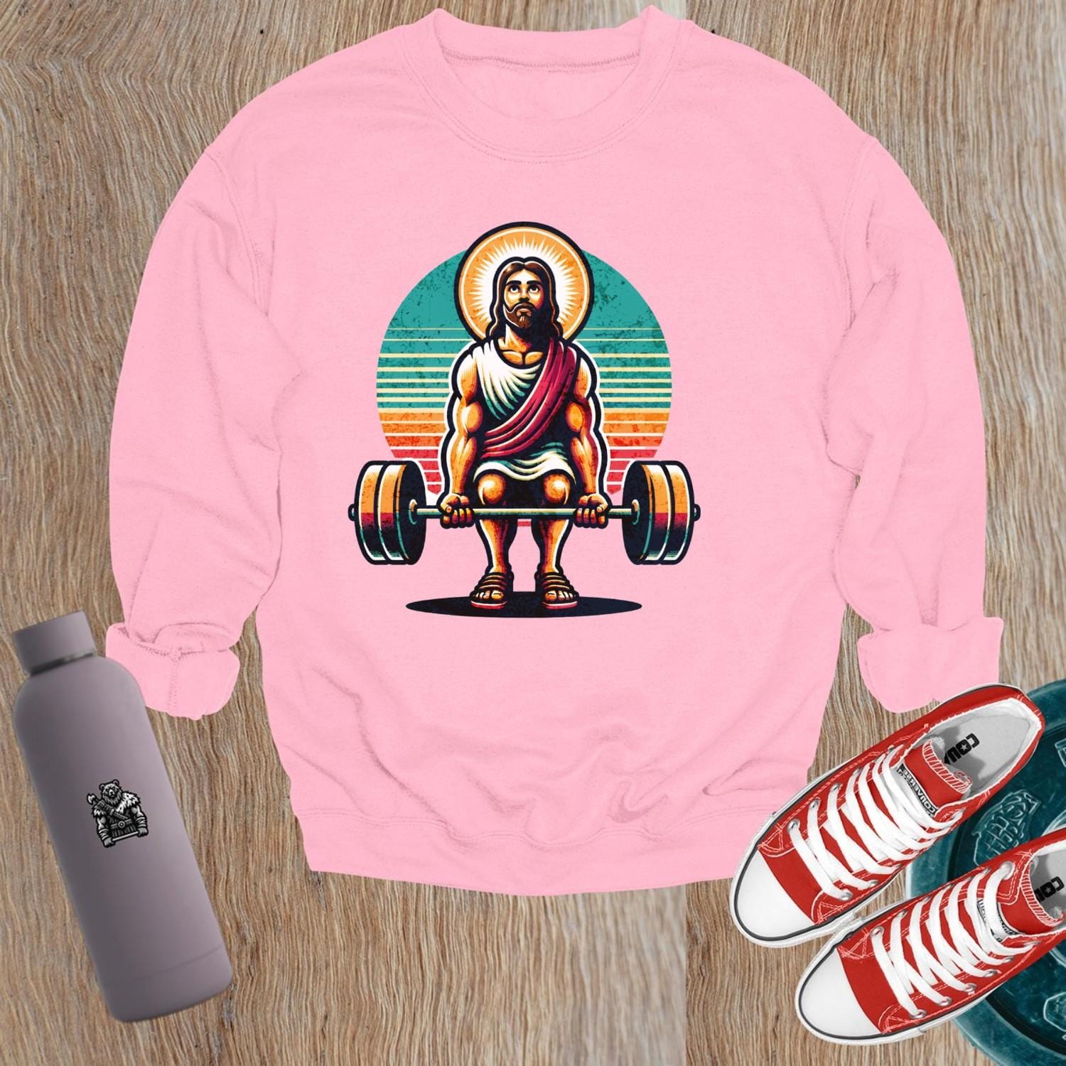 "Graphic gym sweatshirt featuring a bold design symbolizing strength and motivation, perfect for workouts and casual wear."