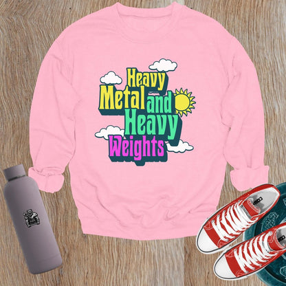 "Vibrant 'Heavy Metal and Heavy Weights' sweatshirt featuring bold graphics, perfect for gym enthusiasts and music lovers, ideal for workouts."