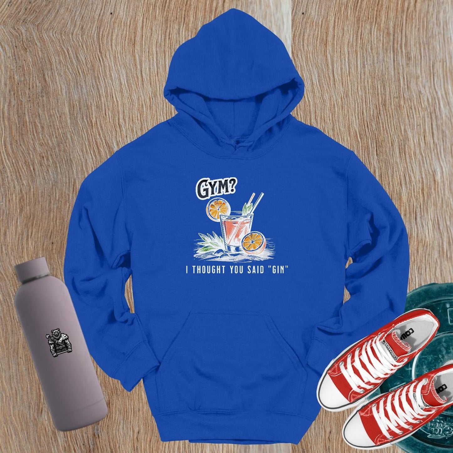 Graphic gym hoodie featuring the slogan "Gym? I thought you said 'gin.'" in playful font, perfect for fitness lovers and casual wear.