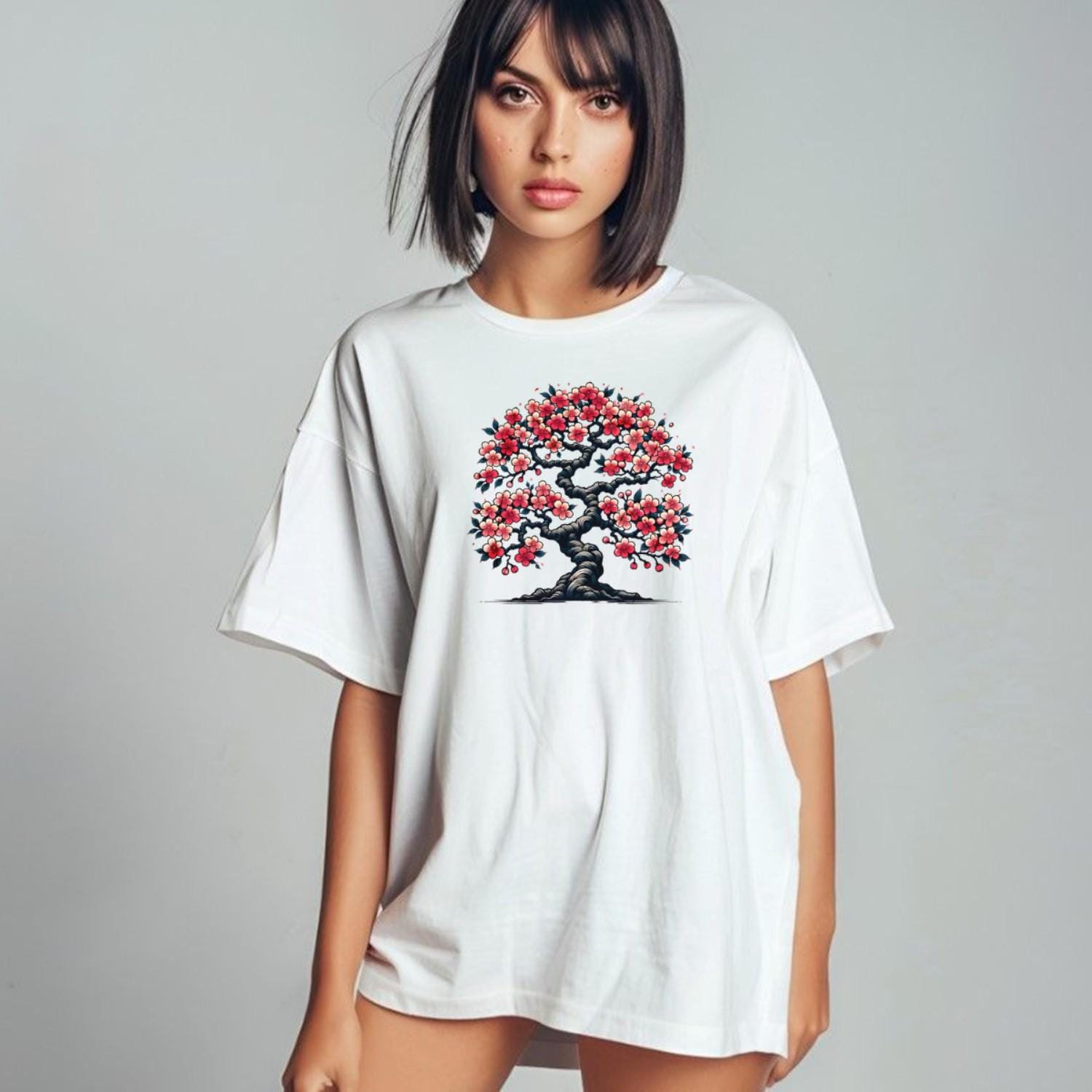 Alt text: "Vibrant cherry blossom tree design on a stylish gym t-shirt, symbolizing strength and resilience for fitness enthusiasts."