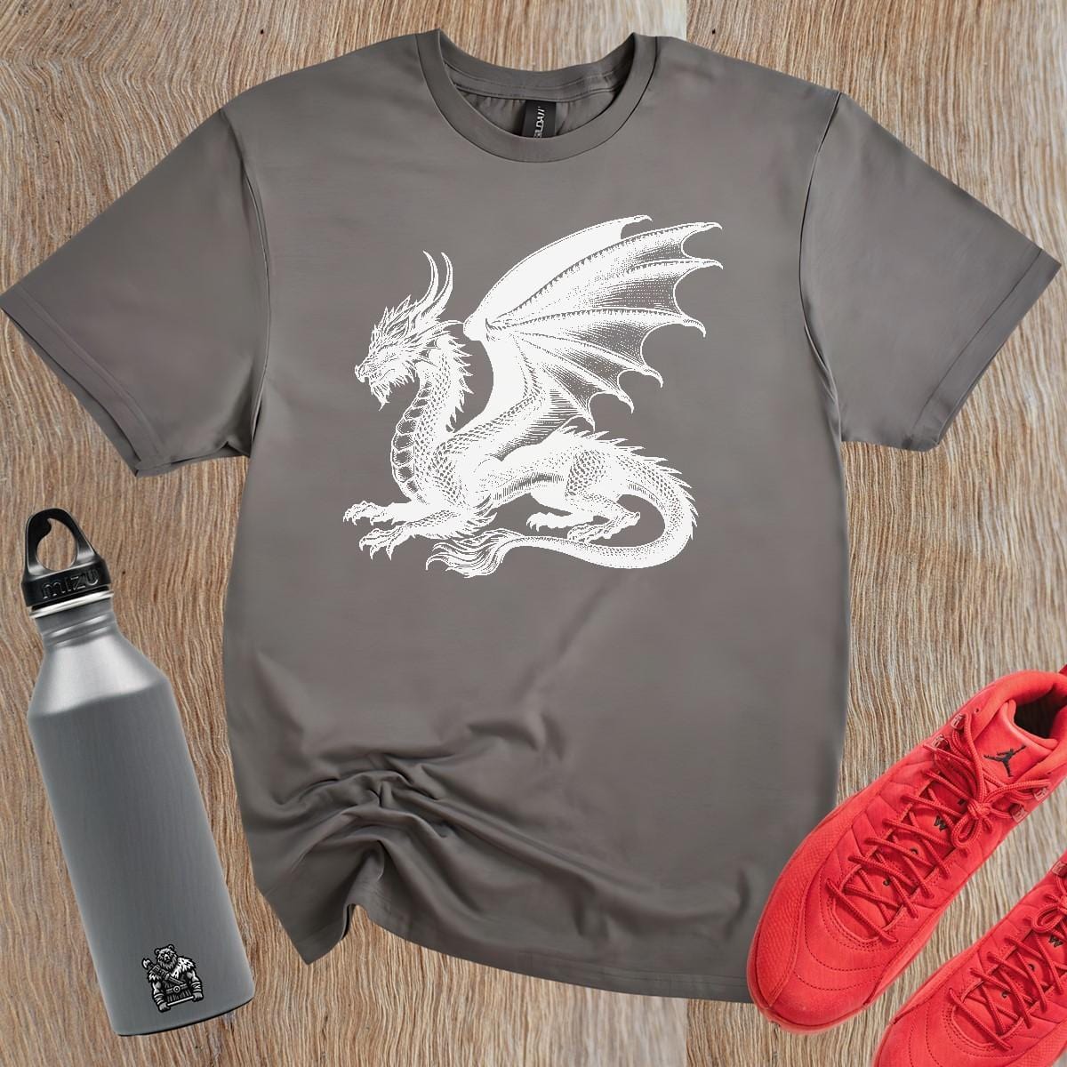 "Epic dragon design T-shirt featuring a fierce graphic, perfect for gym enthusiasts and casual wear, showcasing strength and determination."