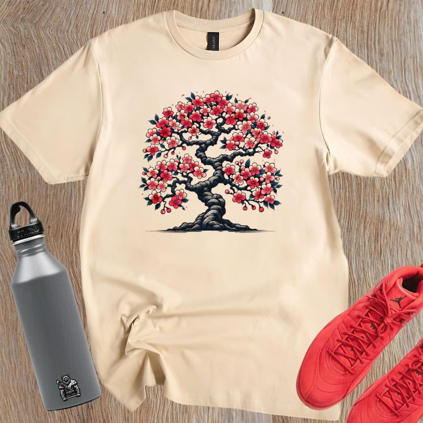 Alt text: "Vibrant cherry blossom tree design on a stylish gym t-shirt, symbolizing strength and resilience for fitness enthusiasts."