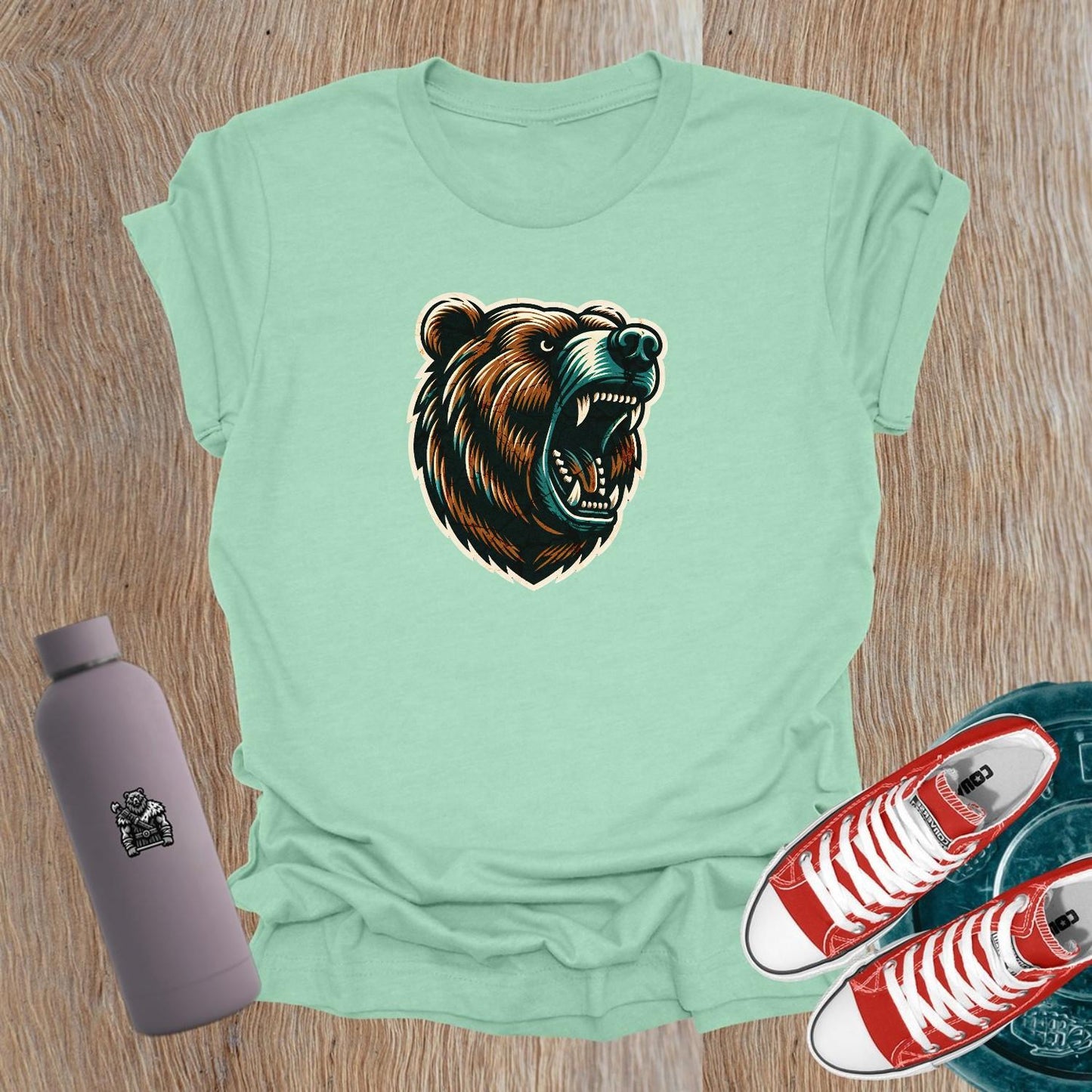 "Bold bear graphic T-shirt for women, symbolizing strength and determination, perfect for lifting and gym workouts. Inspiring fitness wear."