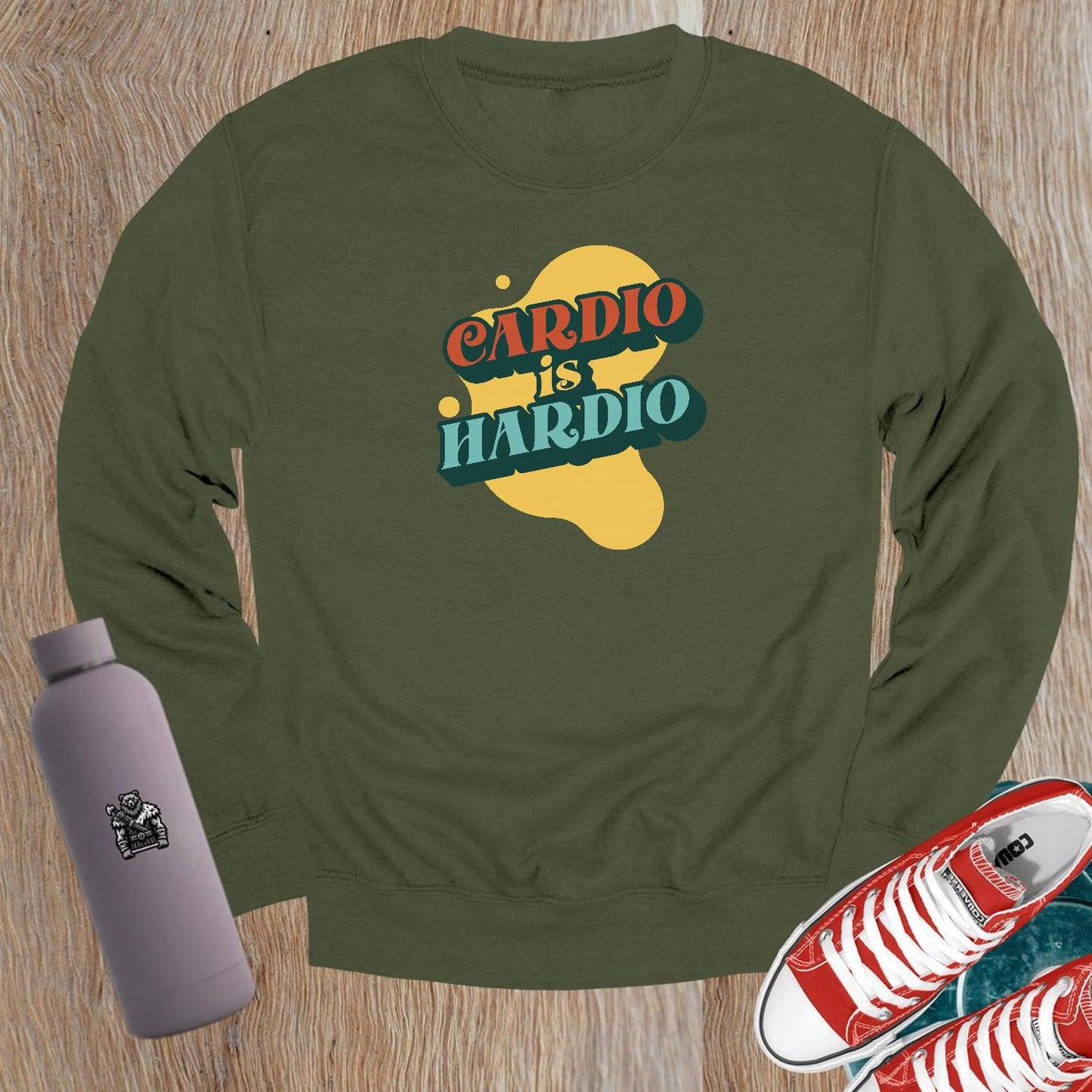 Alt text: "Crewneck sweatshirt with bold 'CARDIO is HARDIO' print, perfect for gym workouts or casual wear, inspiring fitness motivation."