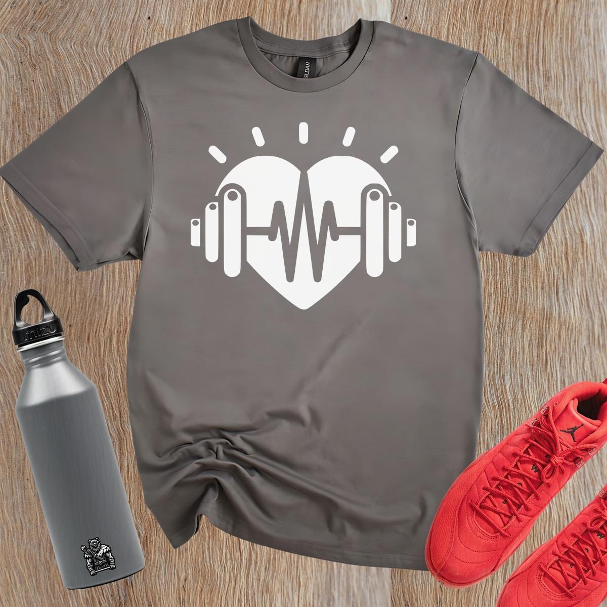 Dynamic gym T-shirt featuring a heart and weights graphic, symbolizing fitness dedication, perfect for workouts and casual wear.
