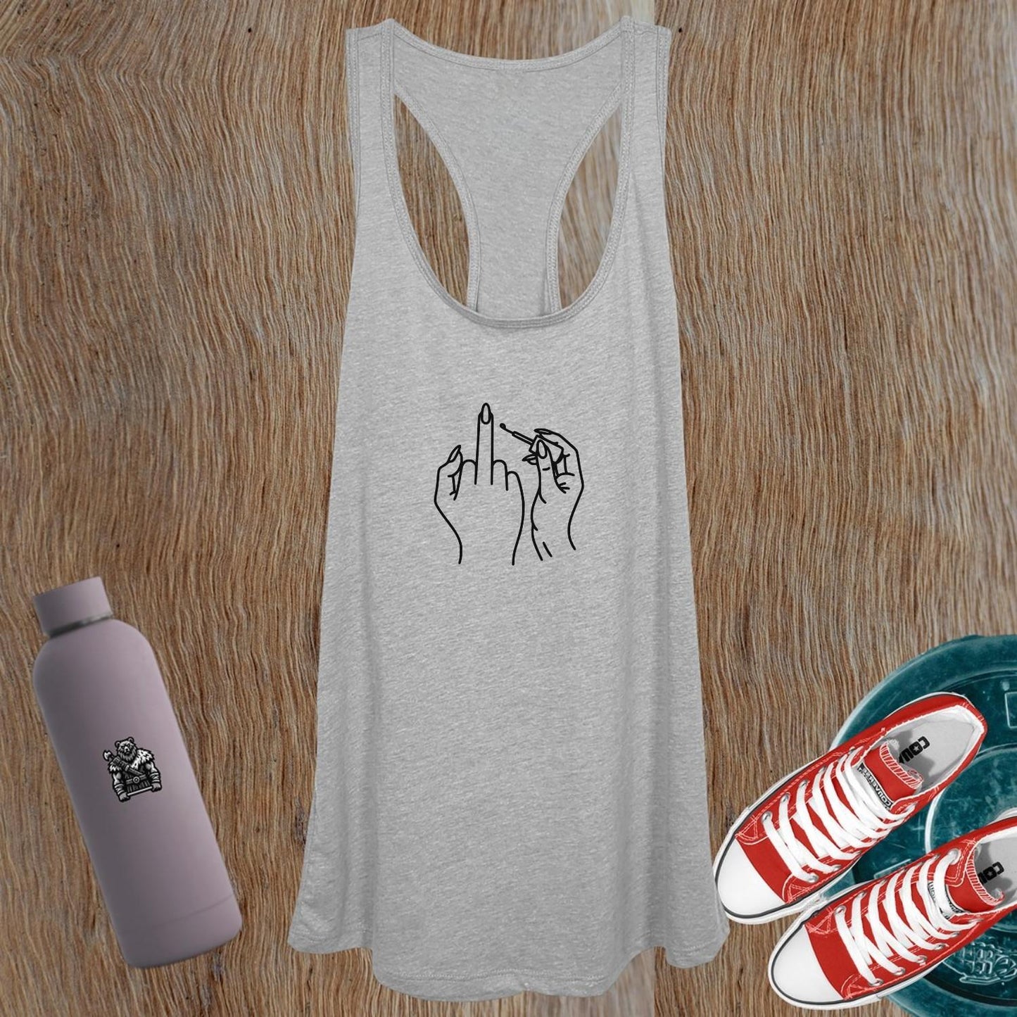 "Stylish women's gym tank top with bold graphic design promoting strength, perfect for workouts, layering, and daily fitness wear."