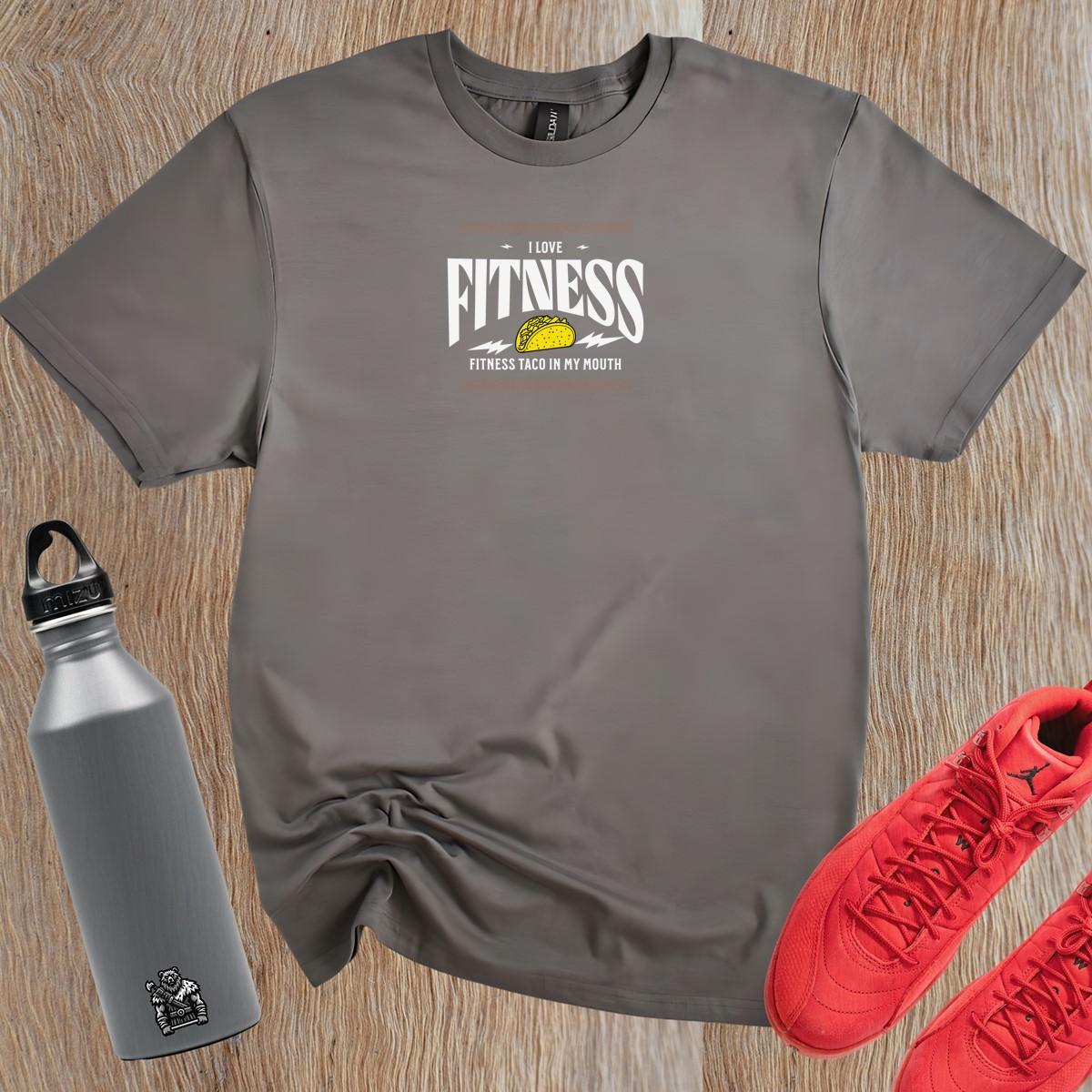 Alt text: Bold graphic gym T-shirt featuring a playful blend of fitness and taco theme, perfect for fitness enthusiasts and conversation starters.