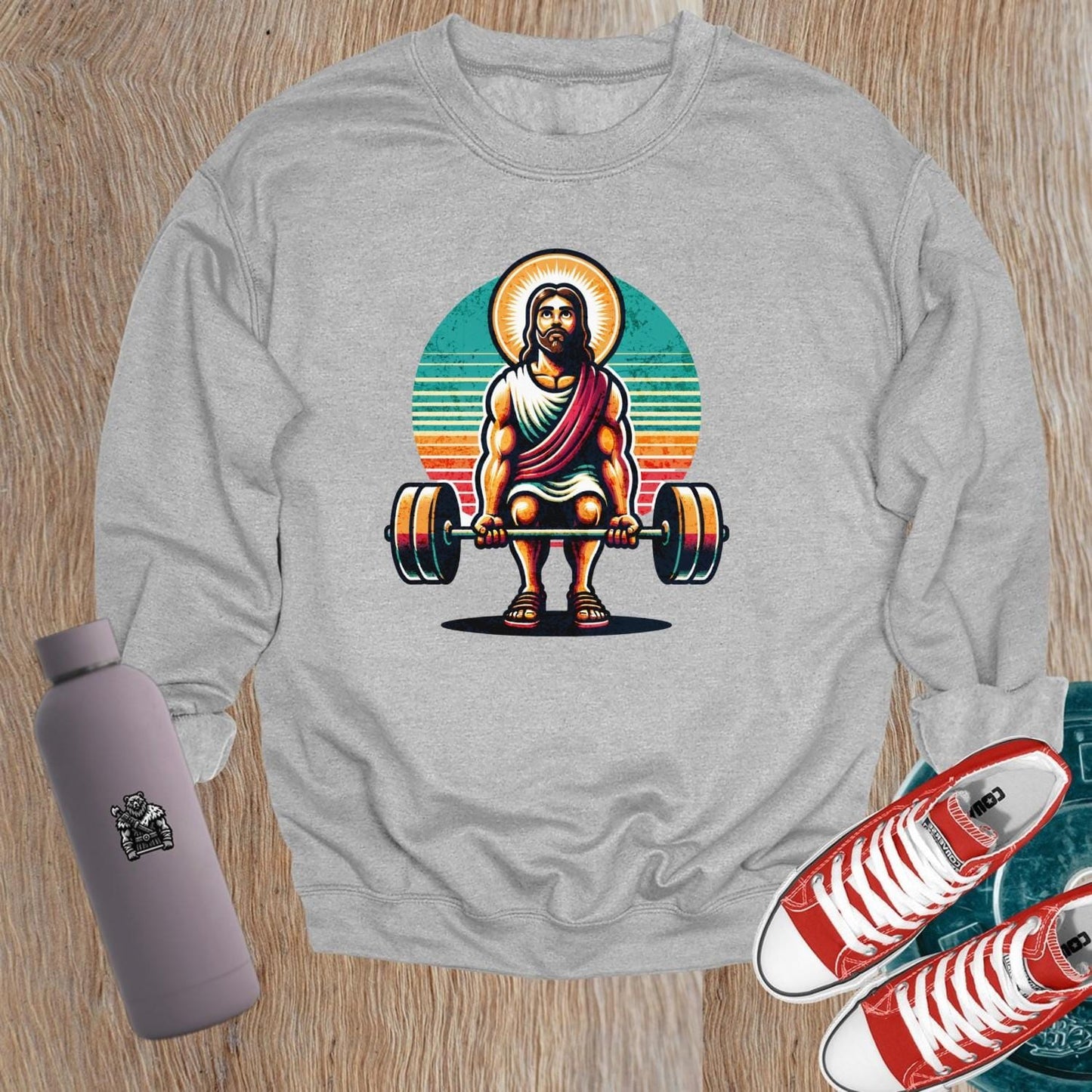 "Graphic gym sweatshirt featuring a bold design symbolizing strength and motivation, perfect for workouts and casual wear."