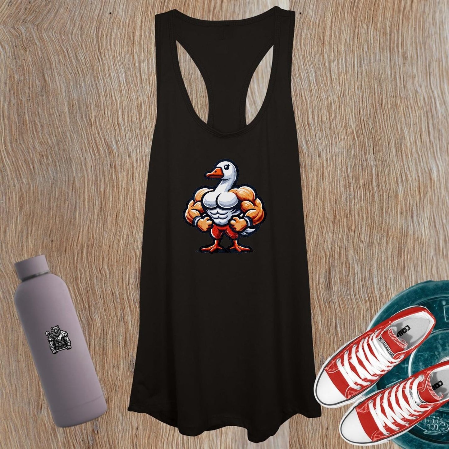 "Women's tank top with a unique muscular duck design, perfect for workouts or casual outings. Stylish activewear for fitness lovers."