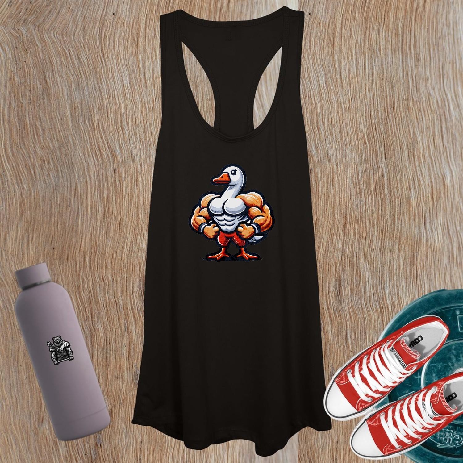 "Women's tank top with a unique muscular duck design, perfect for workouts or casual outings. Stylish activewear for fitness lovers."