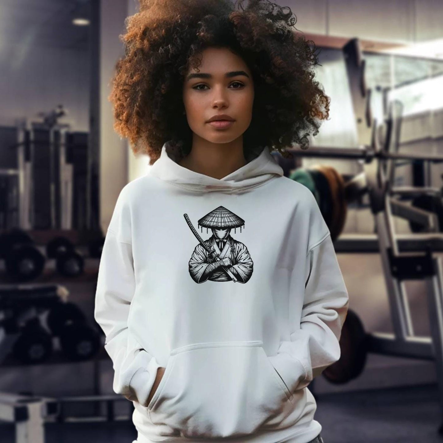 "Stylish gym hoodie with bold logo, relaxed fit for comfort and movement, perfect for workouts and everyday wear. Ideal for fitness enthusiasts."