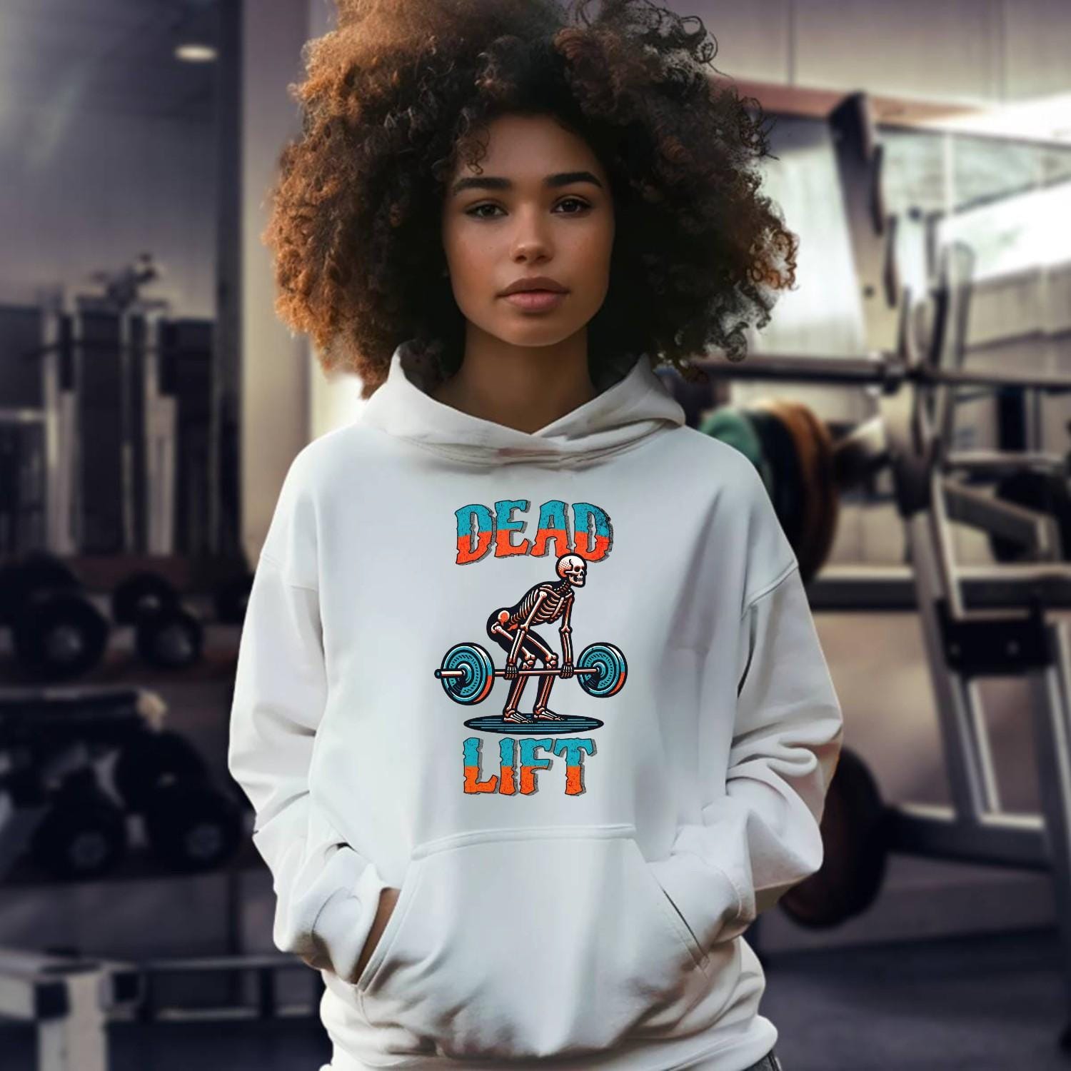 "Black gym hoodie featuring a striking skeleton graphic symbolizing strength and determination, perfect for fitness enthusiasts and workouts."
