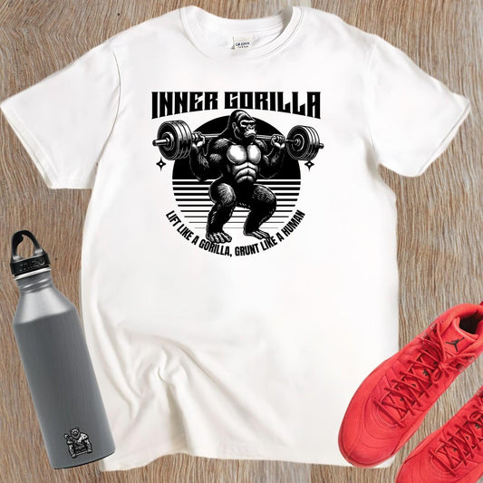 Alt text: "Gorilla Gym T-Shirt featuring a bold graphic of a powerful gorilla lifting weights, symbolizing strength and fitness motivation."