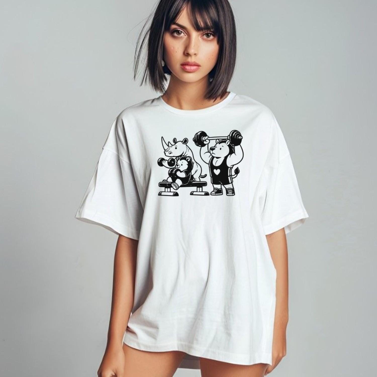 "Playful gym T-shirt featuring a trio of fitness-loving animals, combining fun and comfort for gym enthusiasts and workout motivation."