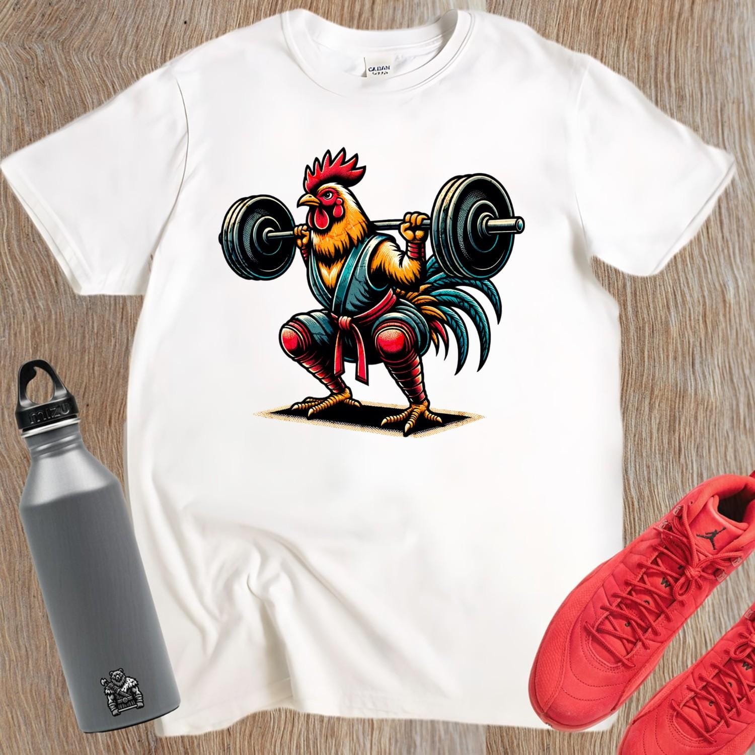 "Vibrant Lift Like a Rooster T-Shirt featuring a fearless chicken lifting weights, perfect for workouts and casual outings, embodying strength and humor."