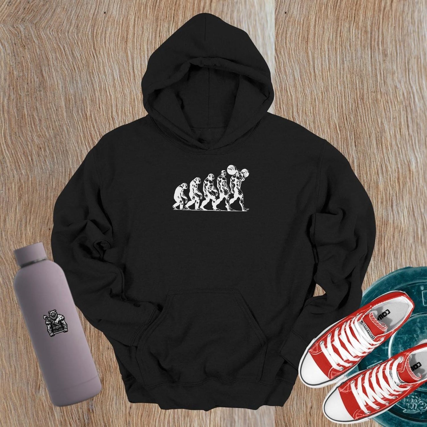 "Men's Evolution Hoodie: a stylish gym hoodie showcasing a dynamic design symbolizing strength and growth, ideal for workouts or casual wear."