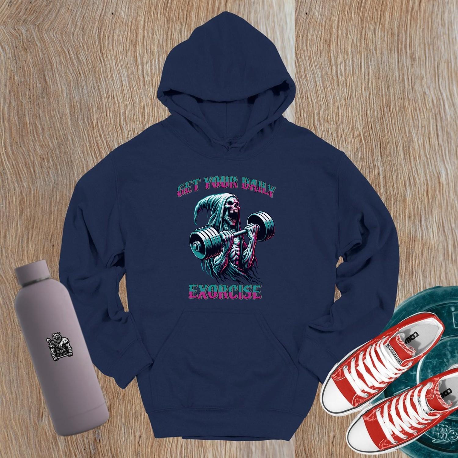 Alt text: "Striking graphic of a fierce skeleton lifting weights on a black hoodie, perfect for gym enthusiasts seeking motivation and style."