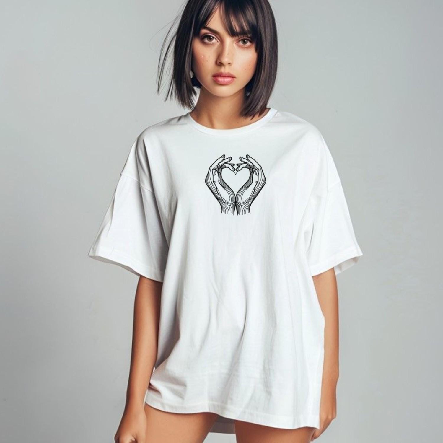 "Heart Hands T-Shirt featuring a bold heart design created by two hands, perfect for gym workouts and casual fitness wear."