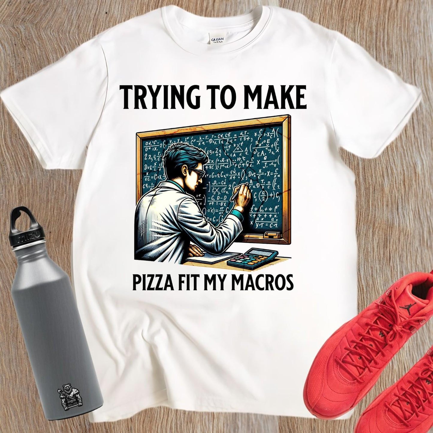 Alt text: "Humorous gym T-shirt design featuring a lab-coated character calculating pizza macros, perfect for fitness enthusiasts who love food."