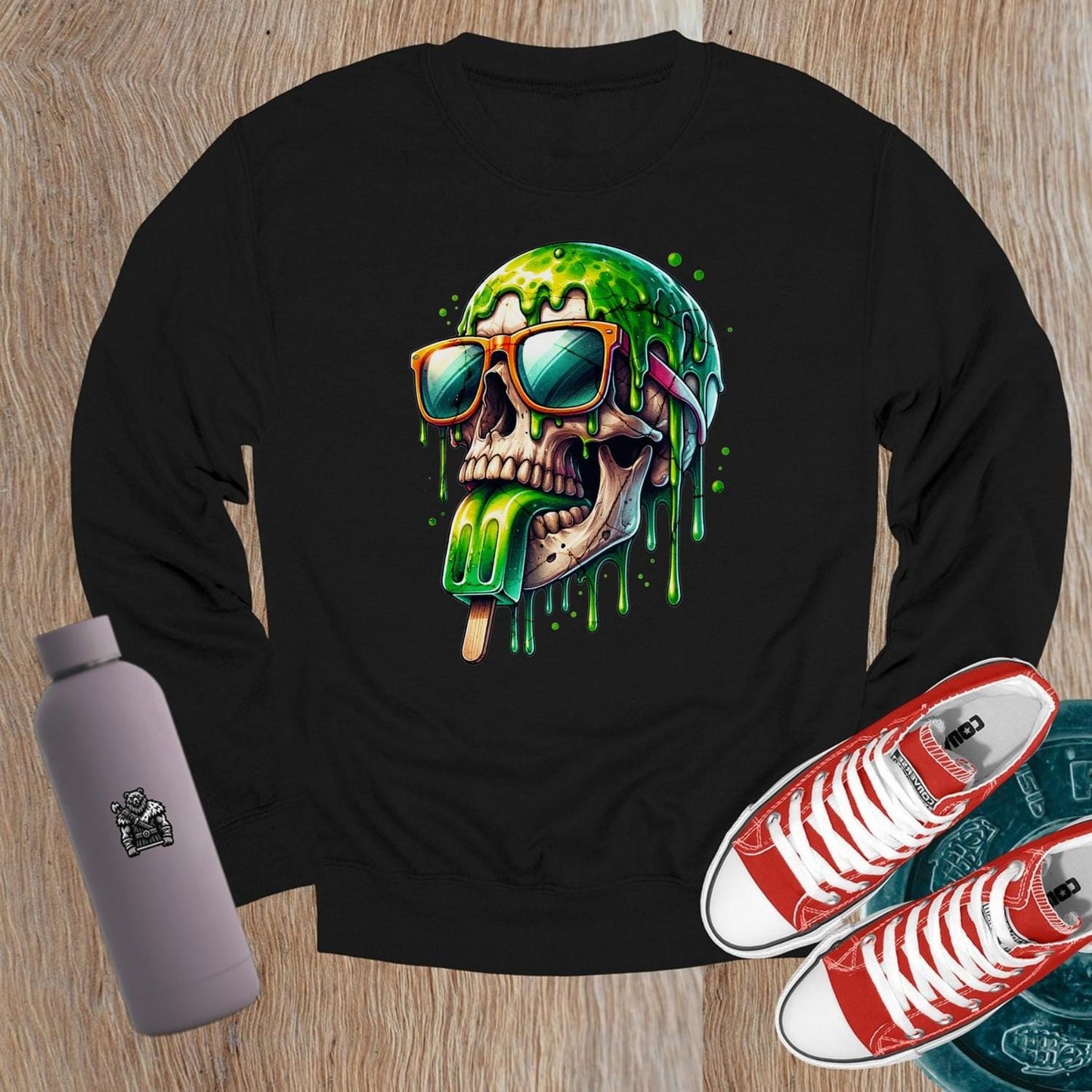 "Edgy crewneck sweatshirt with skull graphic in sunglasses and dripping popsicle, perfect for gym and casual wear, relaxed fit."