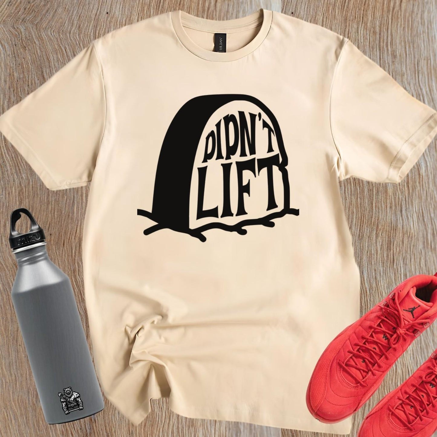 Alt text: "Playful ‘Didn’t Lift’ graphic tee showcasing bold lettering for gym enthusiasts, blending humor and fitness. Perfect for workouts!"