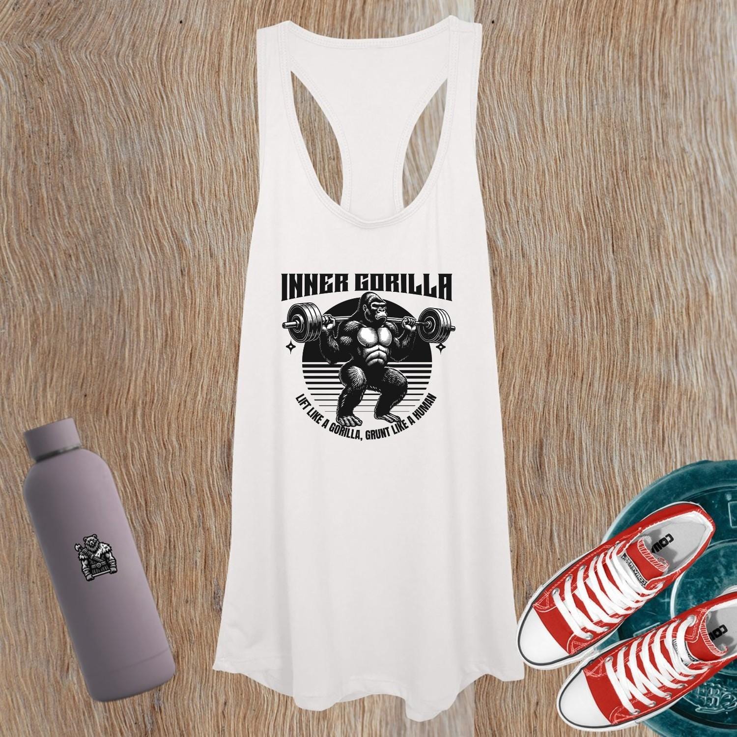 "Women's fitness tank top featuring a fierce gorilla graphic, embodying strength and determination, perfect for gym workouts."