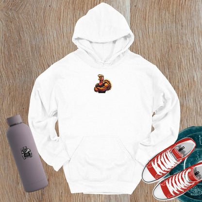 "Bold gym hoodie featuring a fierce, muscle-bound turkey design, perfect for workouts and casual wear, showcasing fitness and competitive spirit."