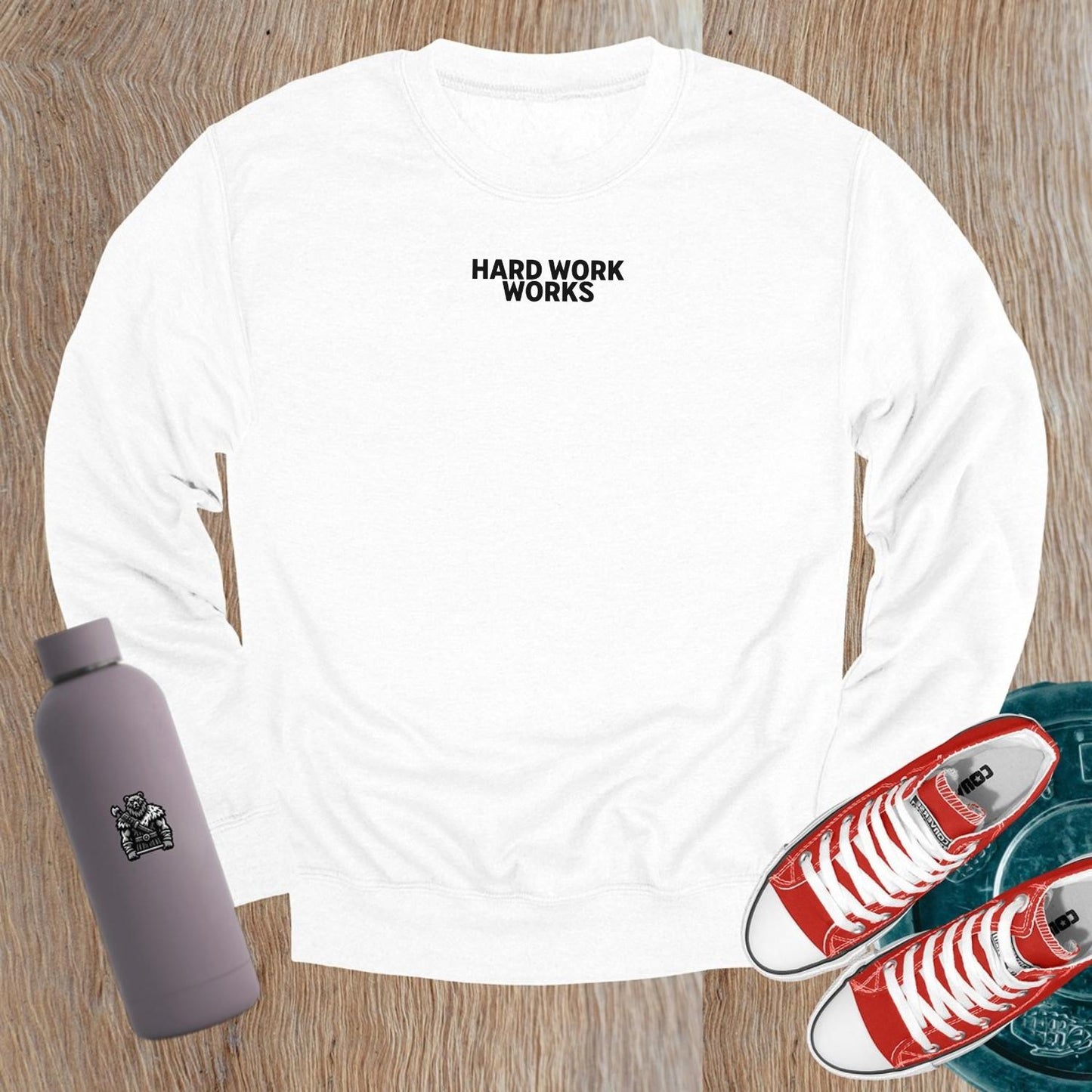 "Hard Work Works gym sweatshirt featuring a motivational graphic, perfect for layering pre- or post-workout, blending style and comfort."