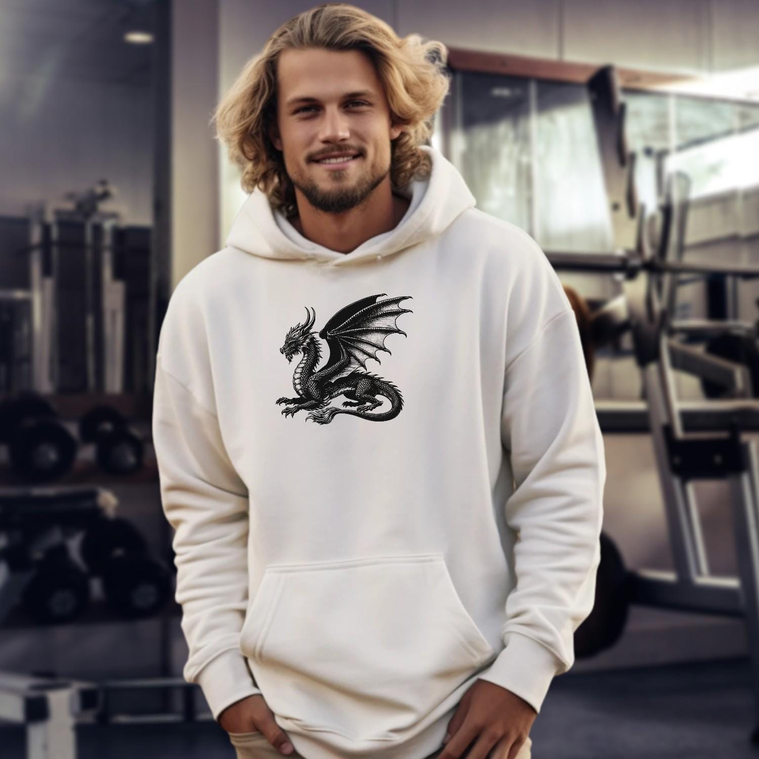 "Black gym hoodie featuring a bold strength logo, relaxed fit for comfort and style, perfect for workouts and casual wear."
