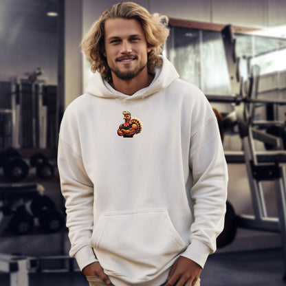 "Bold gym hoodie featuring a fierce, muscle-bound turkey design, perfect for workouts and casual wear, showcasing fitness and competitive spirit."