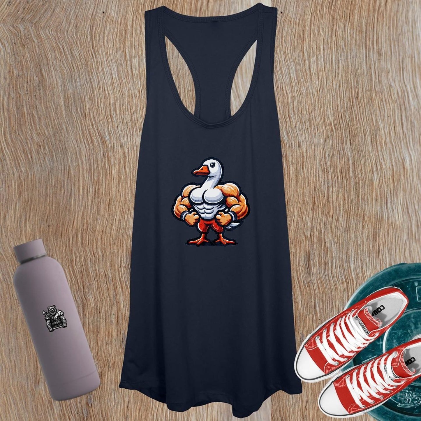 "Women's tank top with a unique muscular duck design, perfect for workouts or casual outings. Stylish activewear for fitness lovers."