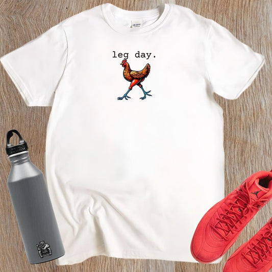 "Vibrant 'Leg Day' gym T-shirt featuring a playful chicken design, perfect for fitness enthusiasts seeking motivation and style."