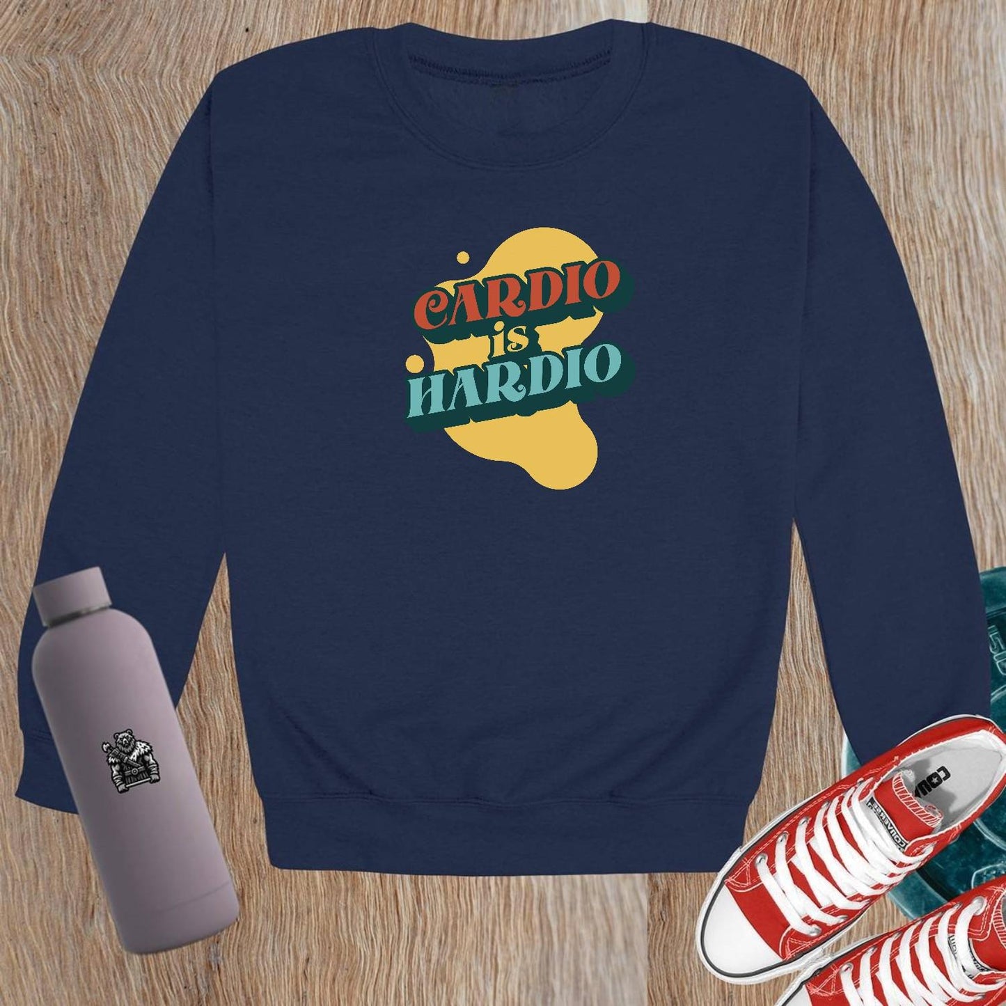 Alt text: "Crewneck sweatshirt with bold 'CARDIO is HARDIO' print, perfect for gym workouts or casual wear, inspiring fitness motivation."