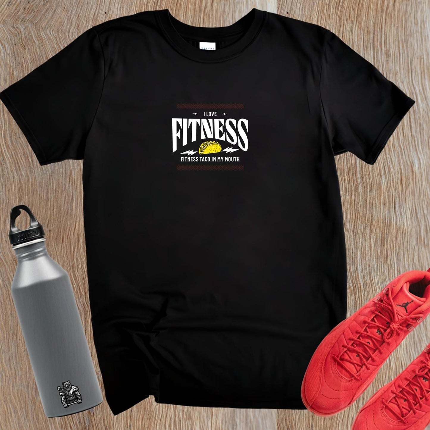 Alt text: Bold graphic gym T-shirt featuring a playful blend of fitness and taco theme, perfect for fitness enthusiasts and conversation starters.