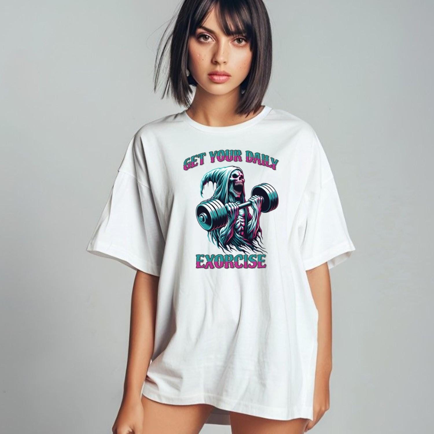 "Muted black T-shirt featuring a striking graphic of a skeleton lifting weights, promoting fitness motivation with a quirky style."