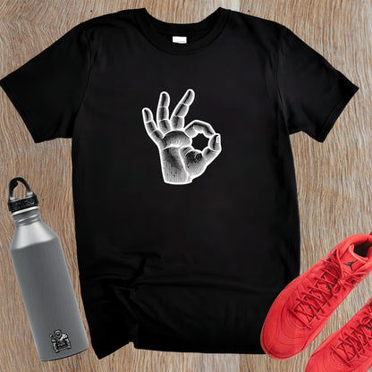 Alt text: "Bold graphic gym t-shirt featuring expressive hand design, perfect for fitness enthusiasts. Motivational workout apparel for lifting, running, and stretching."